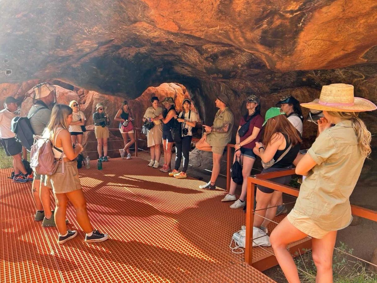 Tour group on a guided walk at Uluru